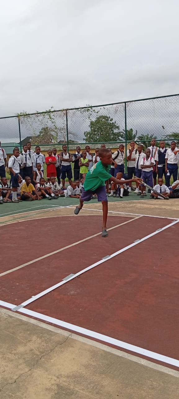 Player mid-swing on court