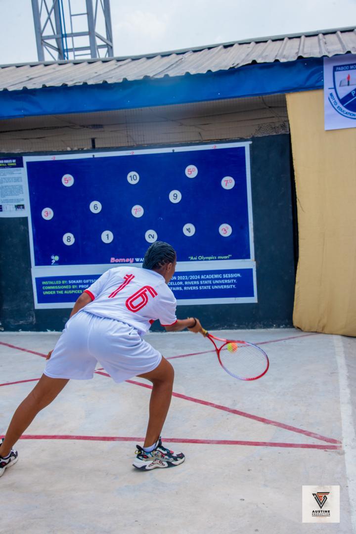 Wall Tennis player returning a shot