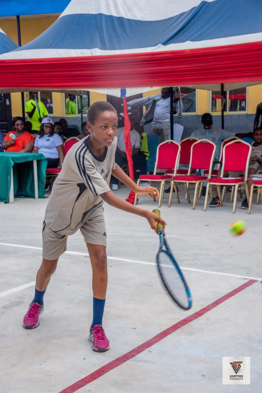 Player serving under the event tent